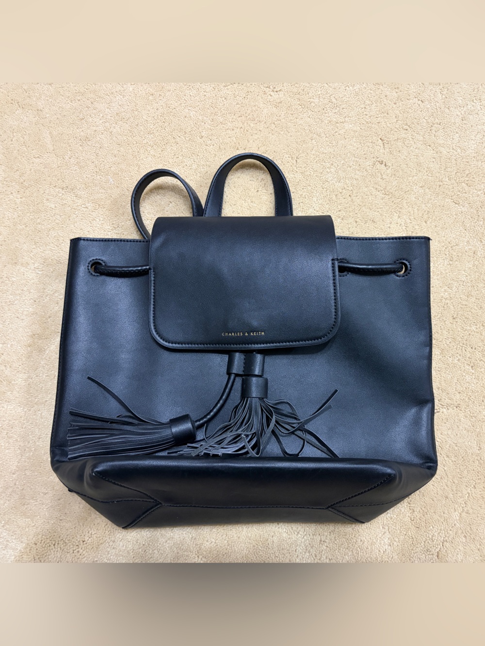 Charles & Keith Black Tassel Drawstring Backpack